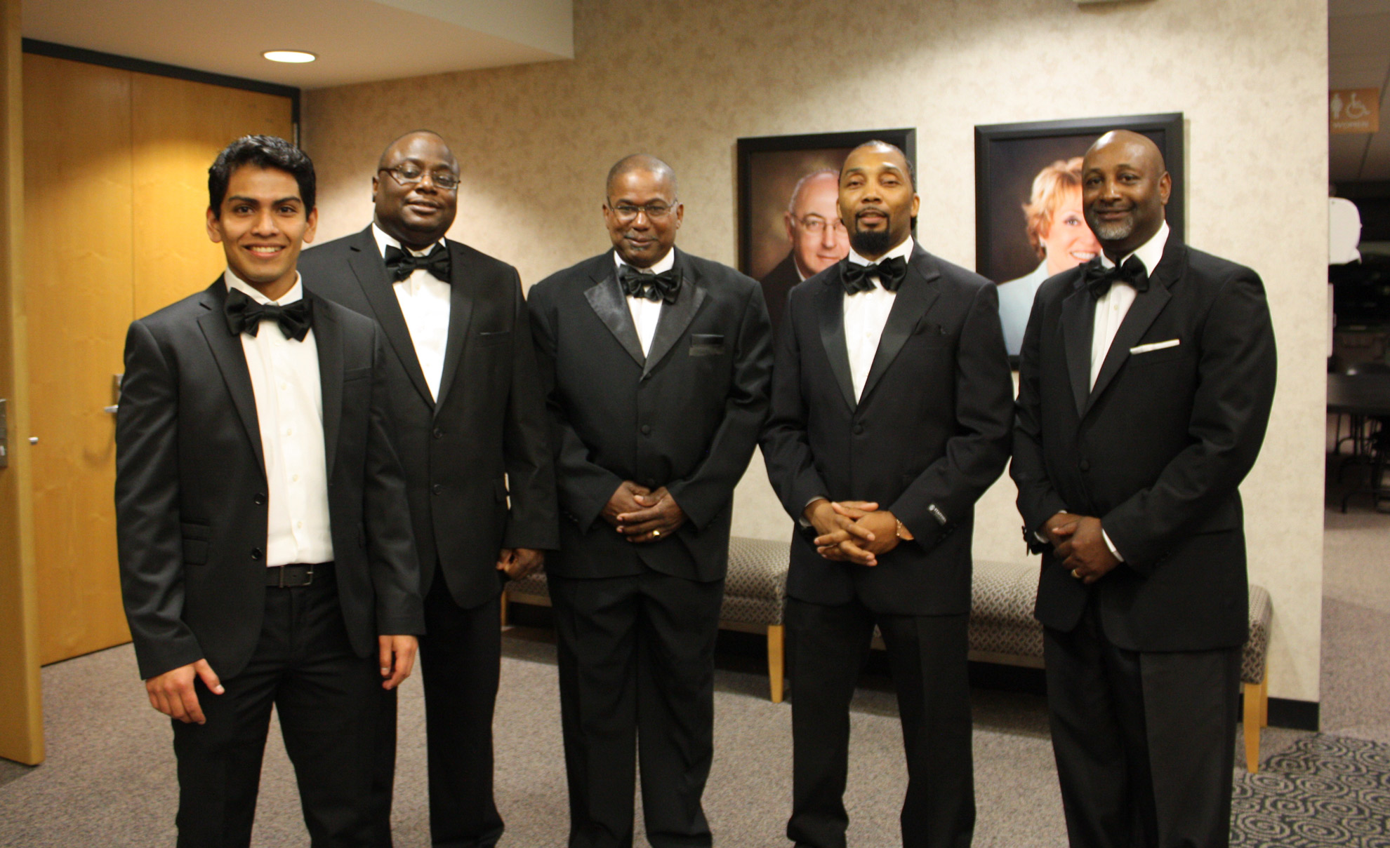 Five men in tuxedos