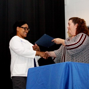 Bernadette Smallwood receives her certification for nurse aide I. Smallwood also completed her certification for phlebotomy.