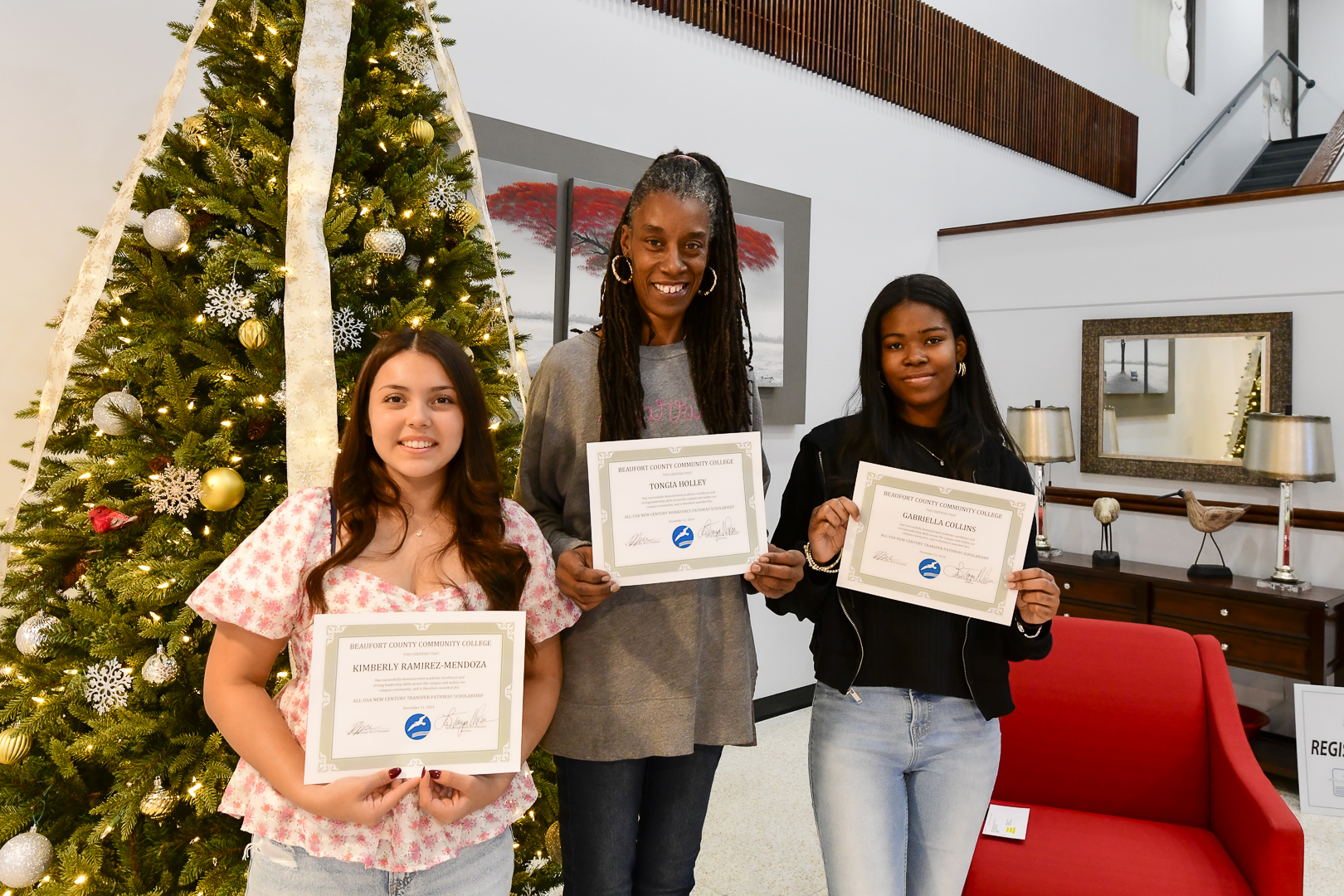 christmas tree, three people, awards