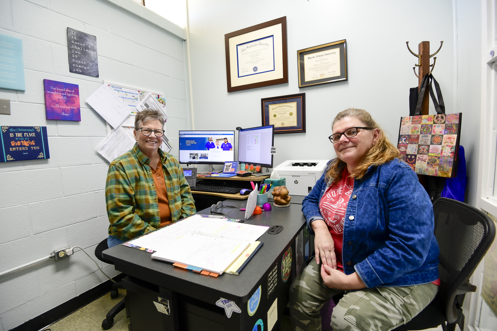 two people in an office