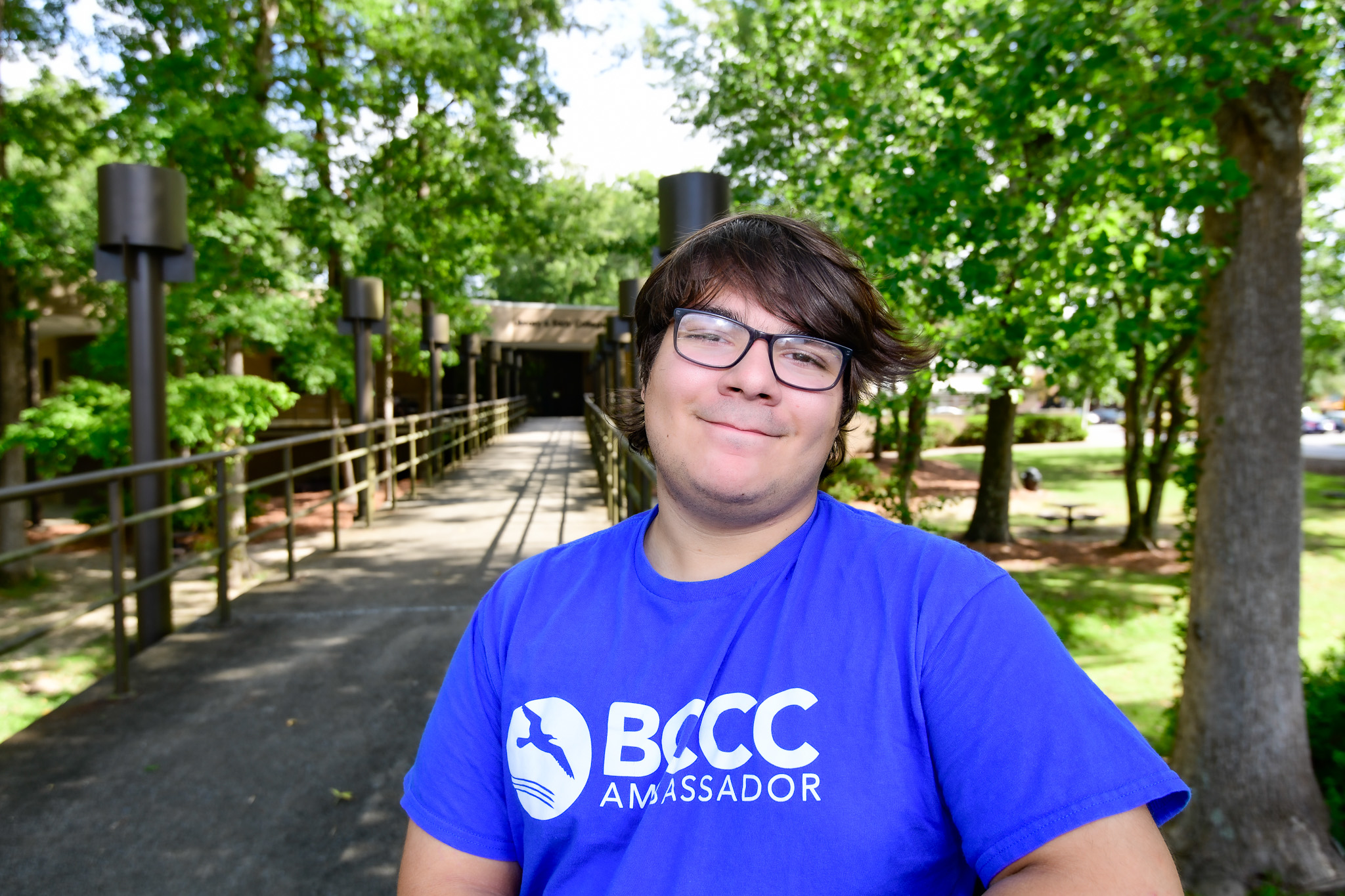 a person in a blue shirt outside