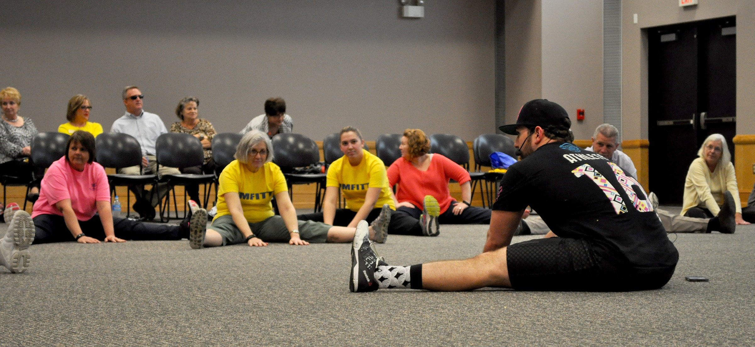 Participants stretch at a previous Beau-Fitt session.