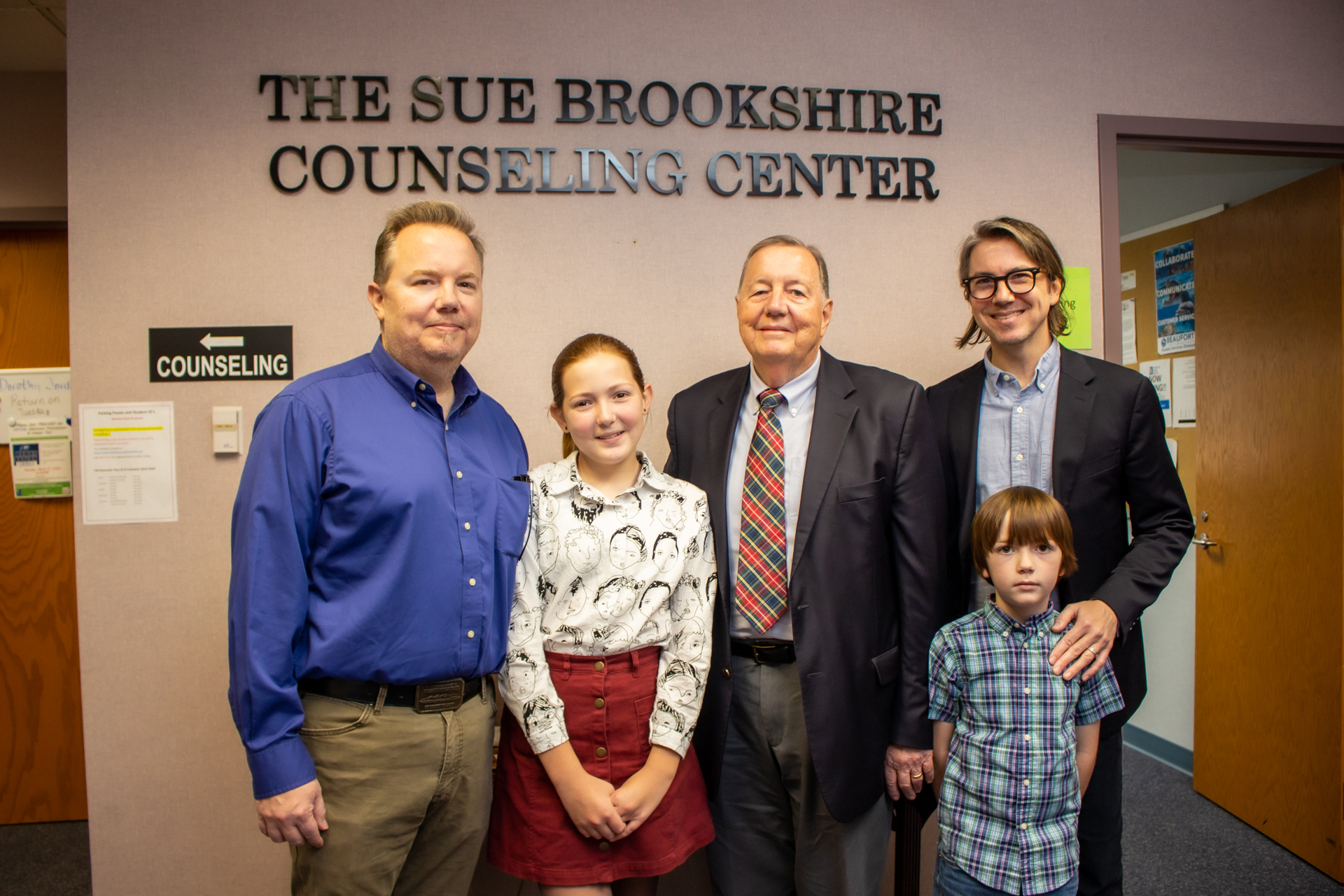 a group with the words The Sue Brookshire Counseling Center