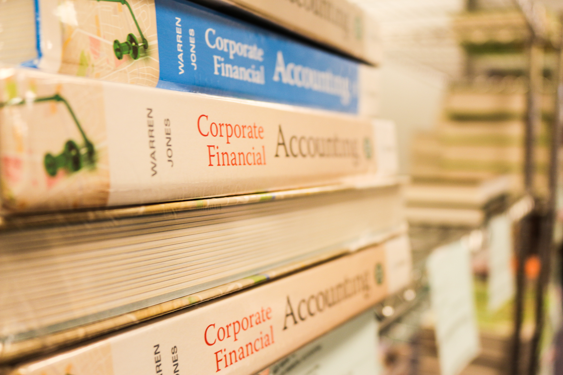 A pile of books reading Corporate Financial