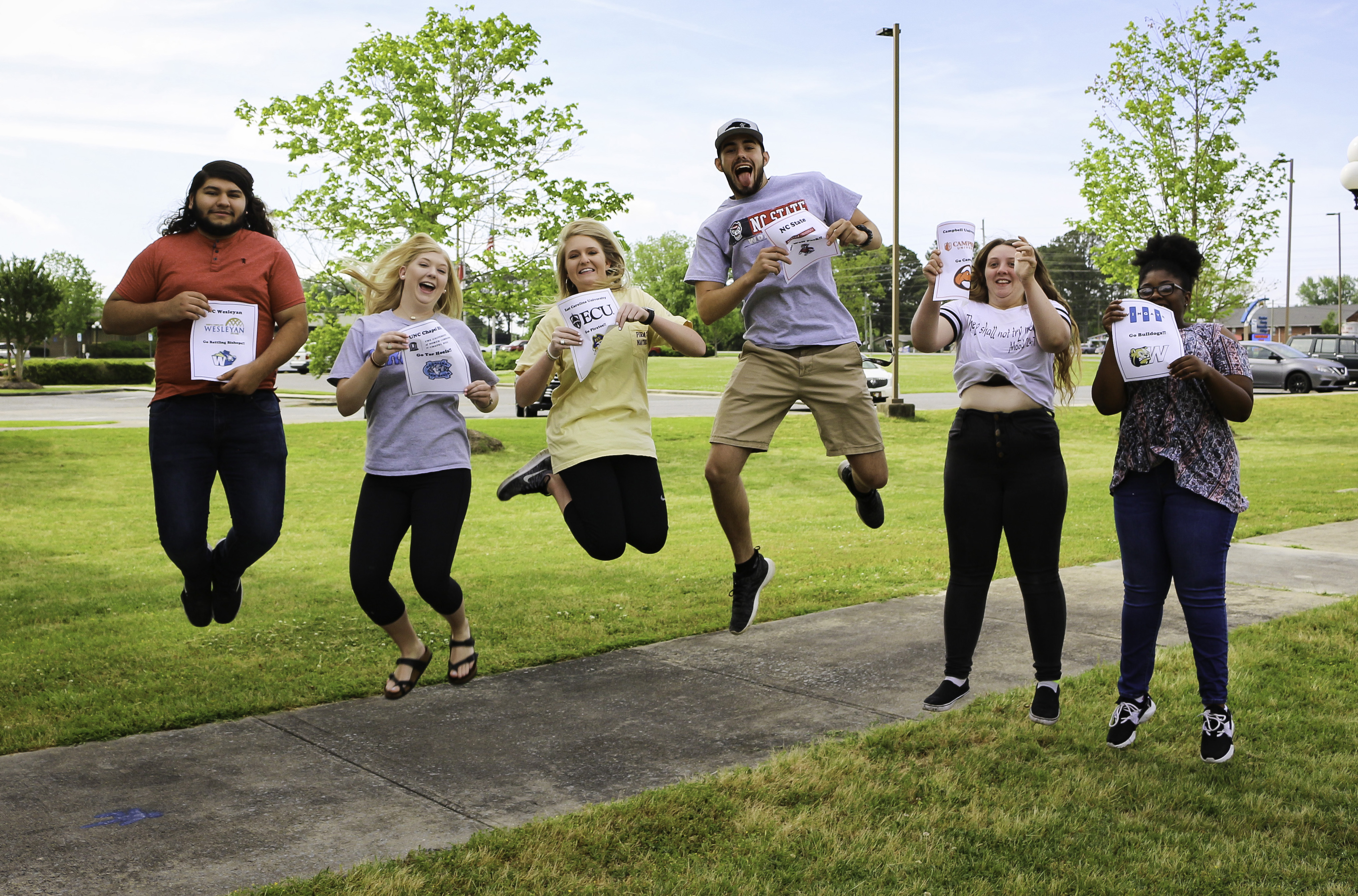 A group of students jumping in the air.