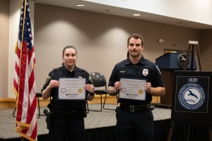 two people with certificates